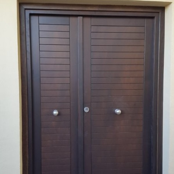 Slotted entrance door