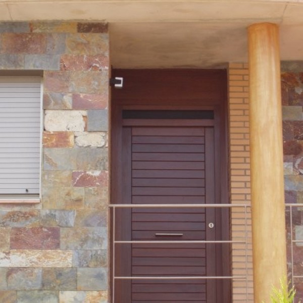 Slotted entrance door